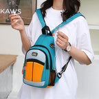 A woman wearing a teal and orange multifunctional backpack with a USB port and side mesh pocket.