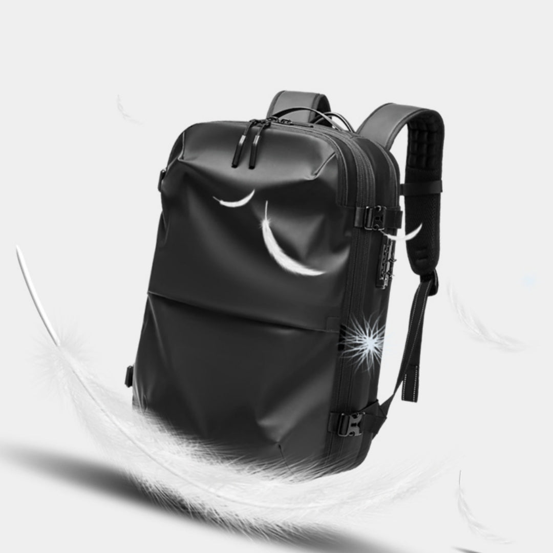 Black, minimalist, waterproof-style travel backpack with side buckle straps and zipper closure on a white background.