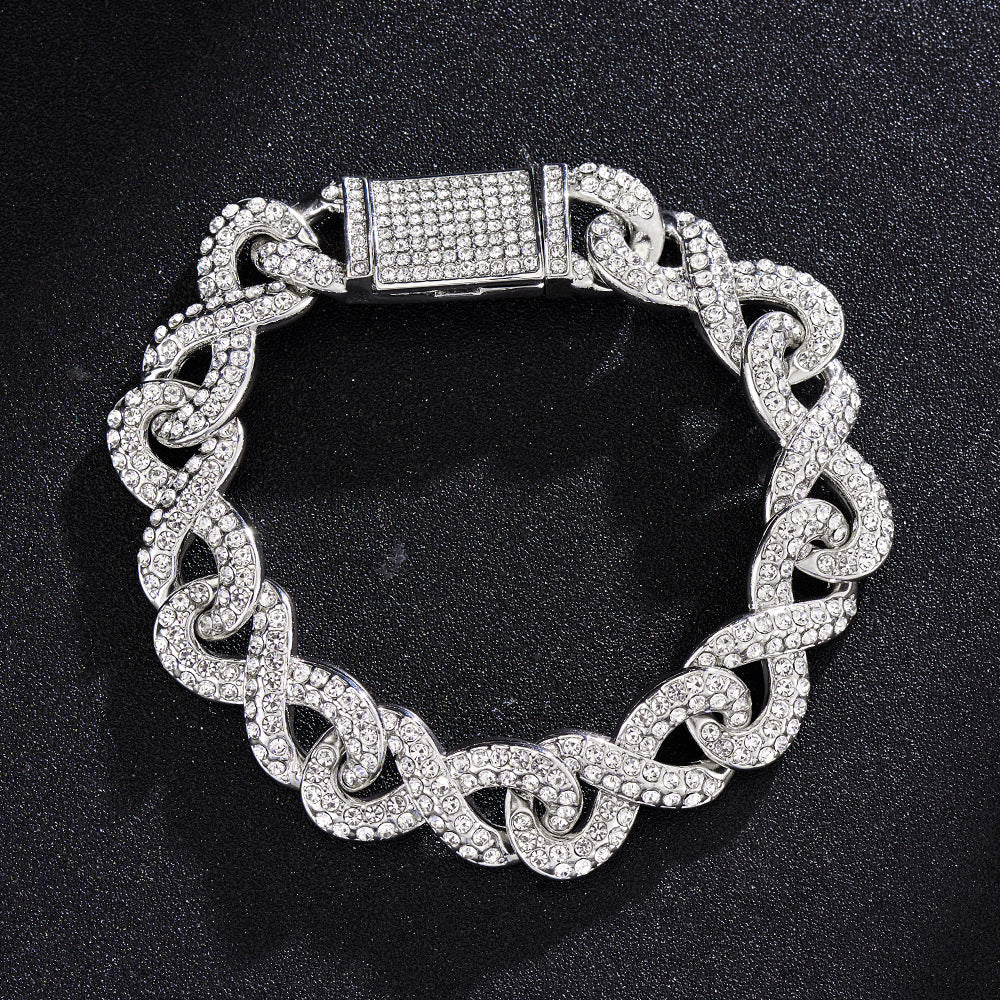 Silver-tone hip hop chain bracelet with interlocking infinity links, fully encrusted in clear sparkling rhinestones.