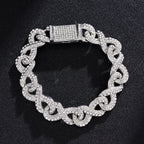 Silver-tone hip hop chain bracelet with interlocking infinity links, fully encrusted in clear sparkling rhinestones.