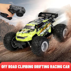 Lime green and black off-road RC truck with oversized knobby tires and rear spoiler, controlled by a handheld remote.