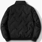 Back view of a black men's winter jacket with a quilted graphene-patterned texture and ribbed cuffs.