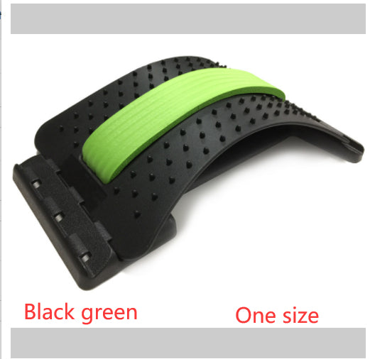 Black and green arched lumbar stretcher featuring a textured plastic base and a soft foam spine support pad.