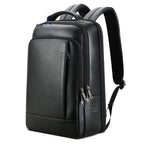 A black leather men's business backpack with multiple zippered compartments, padded straps, and a sleek, modern design.