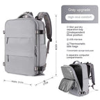 Gray waterproof travel backpack with multiple compartments, USB port, shoe storage, and mesh padded straps.