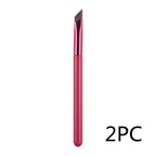 A 2-piece set of thin, angled eyebrow brushes featuring a metallic red handle and dark brown synthetic bristles.