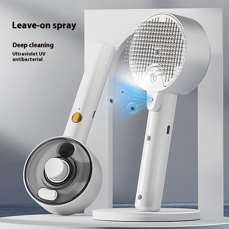 White, sleek pet grooming steam brush with metal bristles, UV light feature, and ergonomic handle for hair removal.