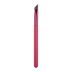 An angled, flat-tipped makeup brush with a vibrant hot pink handle and ferrule against a clean white background.