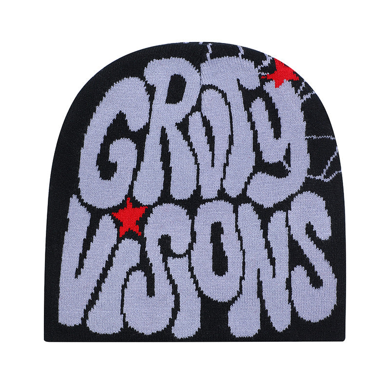 Black knit beanie featuring oversized purple graffiti text, red star accents, and spiderweb detailing.