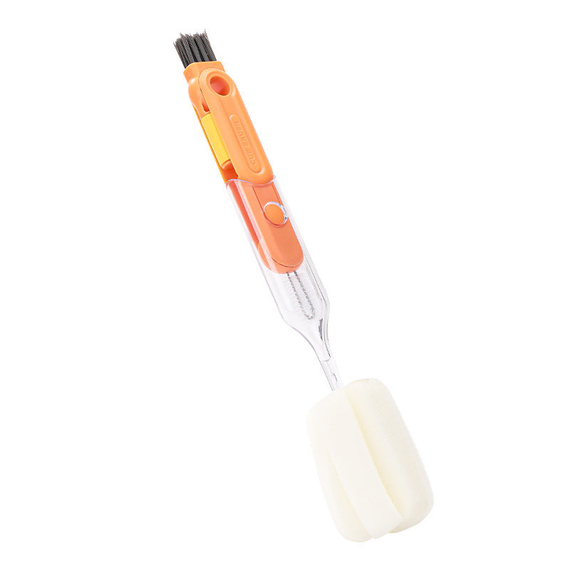 Orange and clear plastic 5-in-1 kitchen cup brush with a removable white sponge and integrated nylon cleaning bristles.