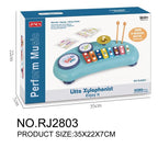 Blue toy xylophone set for toddlers in packaging, featuring 8 colorful metal keys, a mini cymbal, and two drumsticks.