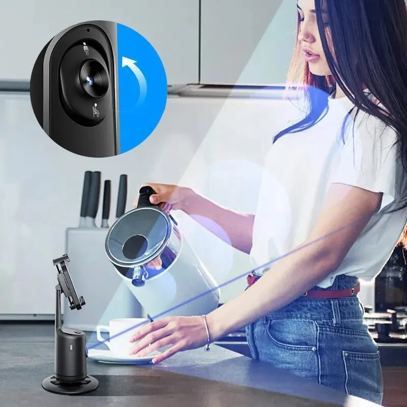 Black 360-degree auto face-tracking phone gimbal on a base, shown tracking a woman pouring tea in a kitchen.