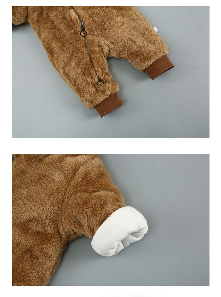 Soft brown fuzzy baby onesie with a zip front and contrasting dark brown cuffs, featuring a cozy white inner lining.