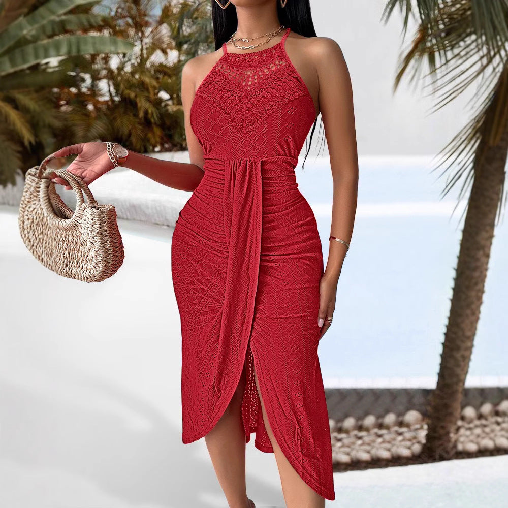 Model in a red sleeveless, halter-neck lace dress with a draped, asymmetric midi-length skirt.