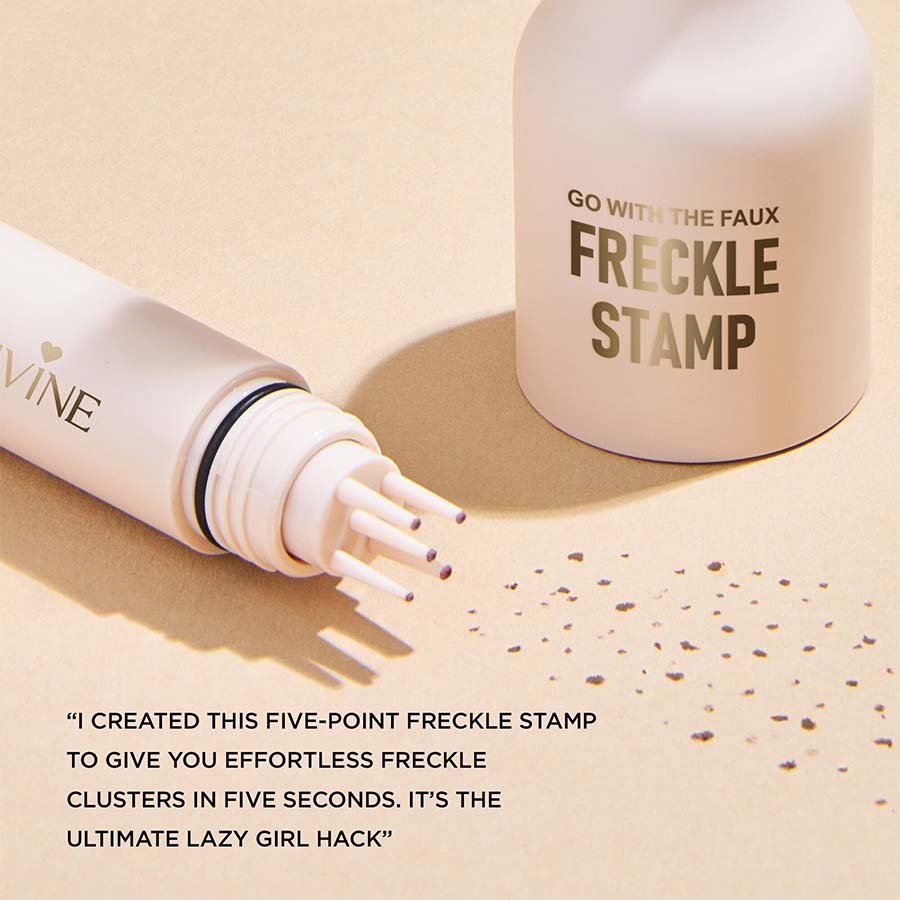 Matte beige Freckle Stamp pen with a five-point applicator, creating small, natural-looking faux freckle clusters.