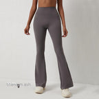 Titanium ash high-waisted, hip-lifting flared fitness pants made of smooth, stretchy athletic fabric.
