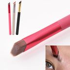Three angled eyebrow brushes in pink, silver, and black, shown with a pink brush applying realistic brow strokes.