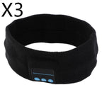 Black fabric sports headband with integrated Bluetooth control panel featuring blue play/volume buttons.