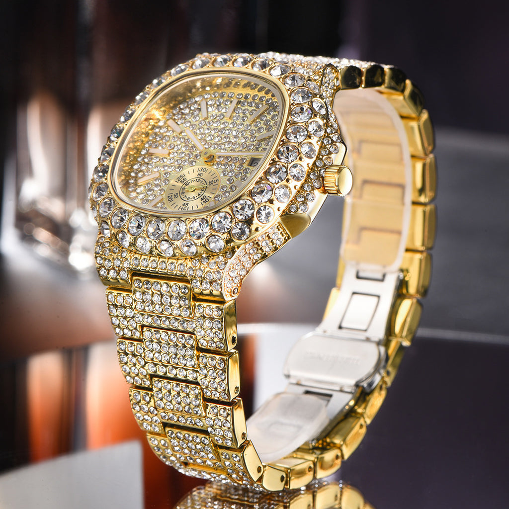 Gold-tone men's quartz watch featuring a fully iced-out diamond-encrusted face, bezel, and link bracelet strap.