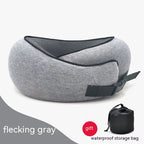 Gray flecked memory foam neck pillow with black mesh trim, adjustable buckle strap, and a black waterproof storage bag.