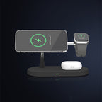Black 5-in-1 magnetic wireless charging station for phone, watch, and earbuds on a dark background.