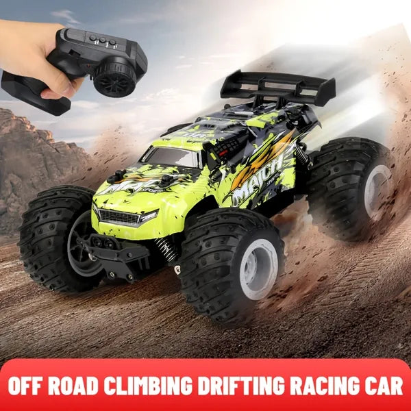 Neon yellow and black RC off-road truck with large tires, spoiler, and handheld remote on a dirt track background.