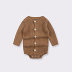 Brown long-sleeve baby bodysuit in ribbed knit fabric with button-front closure and snap-button bottom.