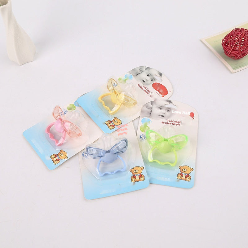 Four colorful, liquid silicone baby pacifiers in blister packs, featuring bear motifs and self-closing protective wings.