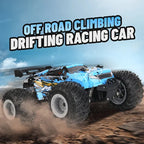 Blue, black, and yellow off-road RC monster truck with large knobby tires racing through dirt against a blue sky.