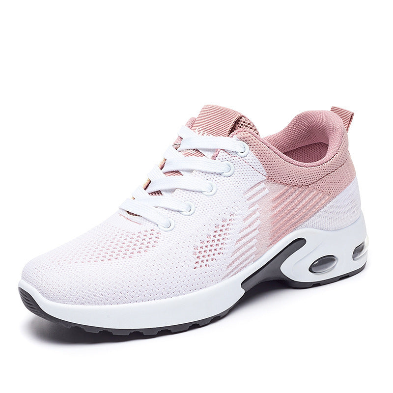 Women's white and dusty pink knit fashion running shoe with white laces and a cushioned air-sole heel.
