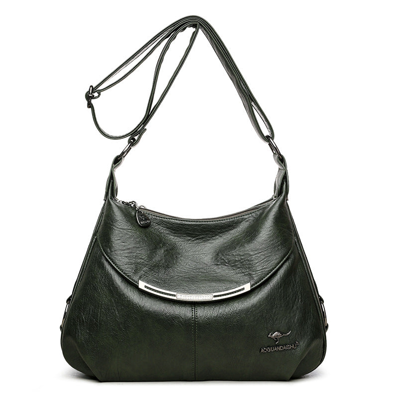 Dark green soft leather shoulder bag with an adjustable strap, silver metal accent, and kangaroo brand logo.