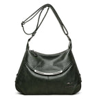 Dark green soft leather shoulder bag with an adjustable strap, silver metal accent, and kangaroo brand logo.