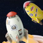 White and yellow plastic rocket water sprinkler toys with space-themed decals against a starry background.