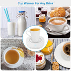 White electric mug warmer pad with a central heating surface and indicator light, shown with a mug of coffee.