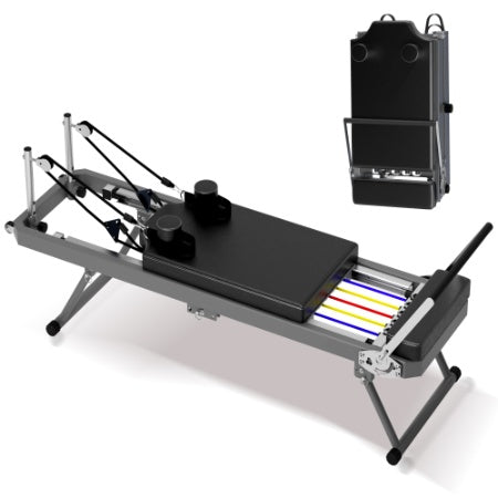 Foldable black Pilates reformer with colored resistance springs, steel frame, and sliding carriage, shown set up and folded.