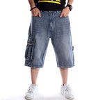 Blue denim hip-hop cargo shorts with multiple pockets, loose fit, and camouflage pocket detailing.