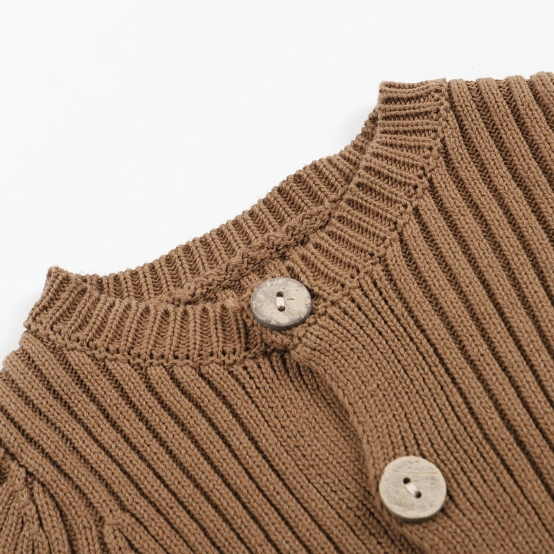 Brown ribbed knit baby bodysuit featuring a crew neckline and two large, light-colored wooden buttons.
