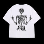 Oversized white cotton t-shirt with a black line-art graphic of a skeleton giving the middle finger on the back.
