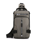 Grey multifunctional nylon crossbody chest bag with "PROFESSIONAL" label, multiple zippers, and adjustable straps.