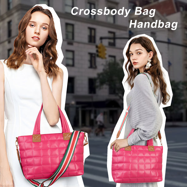 A woman carries a rose-colored, quilted puffer tote bag with a striped, adjustable crossbody strap.