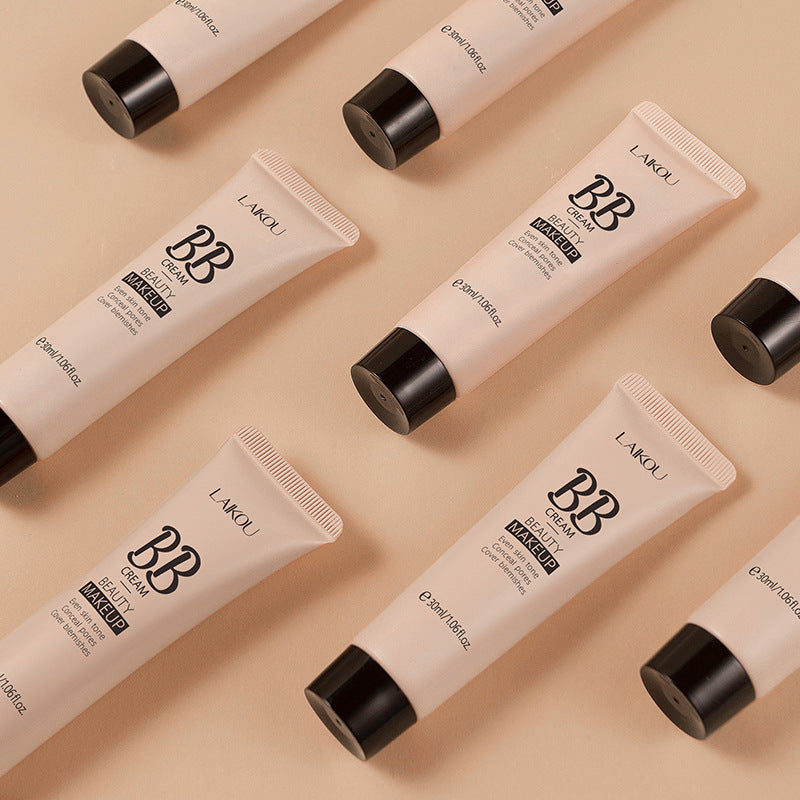Multiple Laikou 30ml BB cream tubes in beige plastic with black caps arranged on a matching beige background.