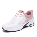 Pink and white women's casual sneaker with breathable mesh upper, lace-up closure, and cushioned air-sole heel.