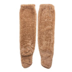 A pair of plush, tan-colored fleece leg warmers with a fuzzy, soft texture, laid flat against a white background.