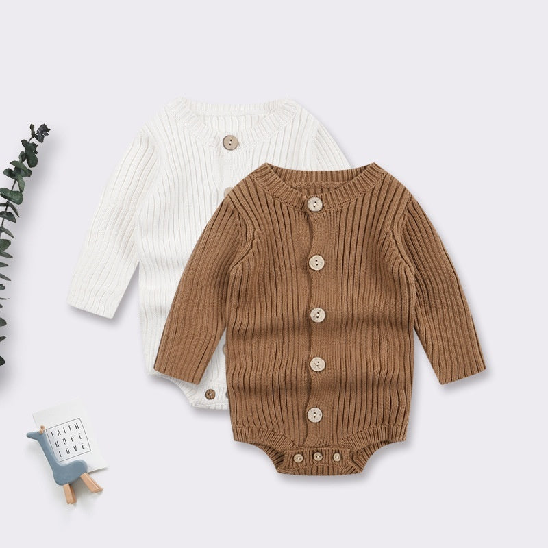 Two long-sleeve, ribbed-knit baby bodysuits in white and brown, each featuring a front button placket and snap closure.