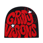 Black knitted hip-hop beanie with bold red "GRITY VSONS" lettering, web details, and white star accents.