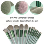 13-piece makeup brush set with green handles, metallic ferrules, and soft, dense synthetic bristles of varying sizes.