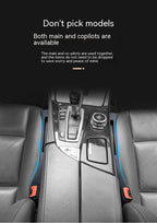 Black car seat gap storage organizers installed between front seats, keeping items from falling into console gaps.