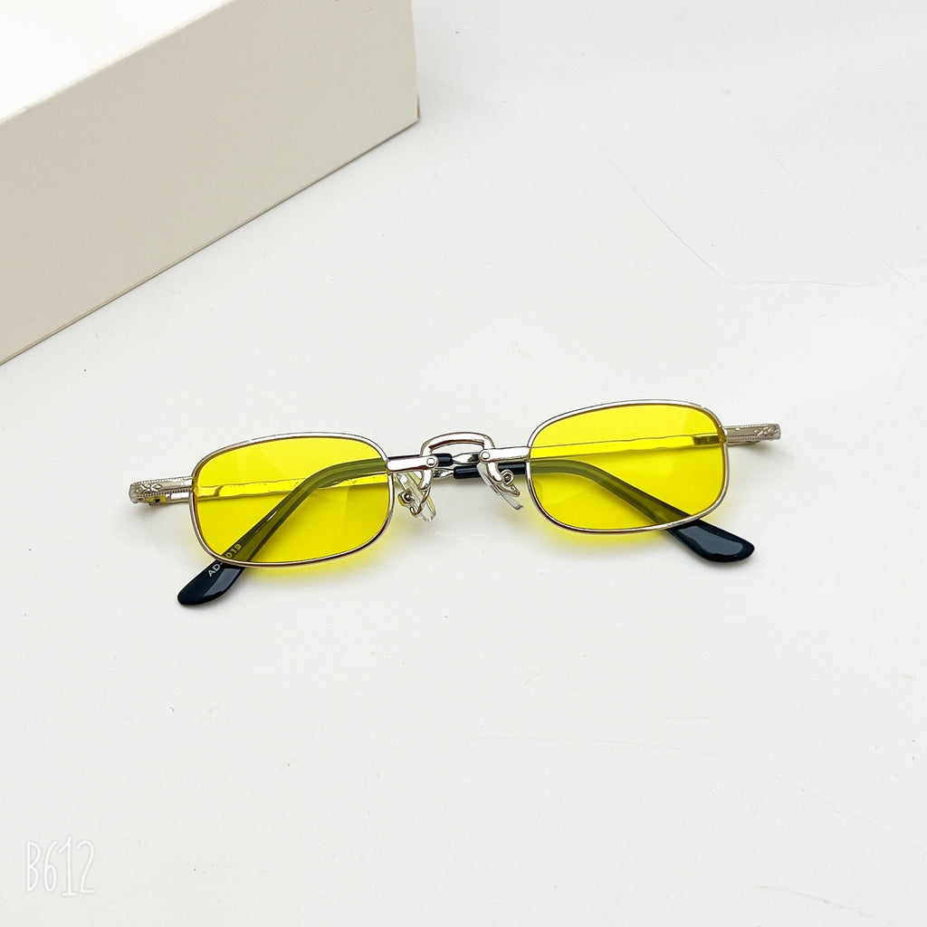 Retro small rectangular sunglasses with vibrant yellow lenses, silver metal frames, and black temple tips.
