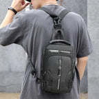 Black multifunctional nylon crossbody chest bag with adjustable strap, top handle, and zippered compartments.