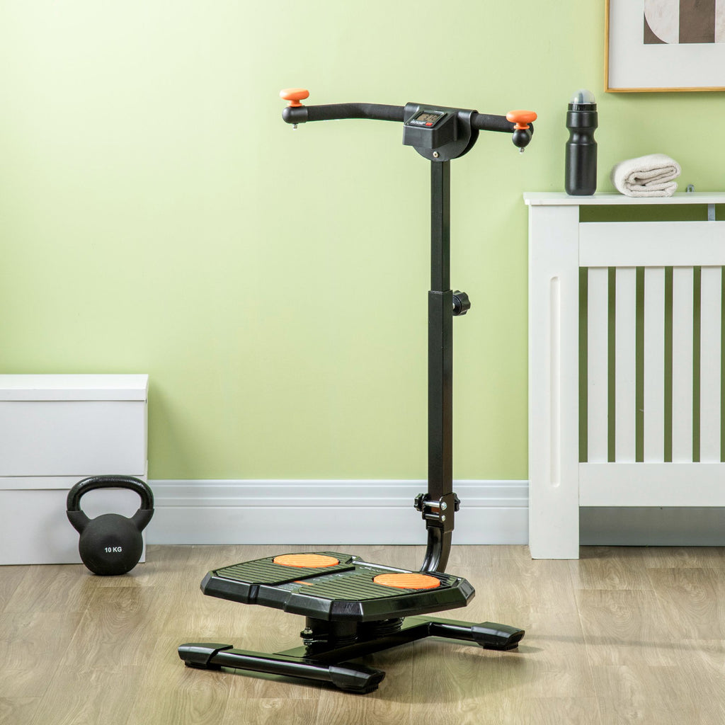 Black foldable ab twister board with orange foot pads, handlebar, and digital fitness monitor on a wooden floor.